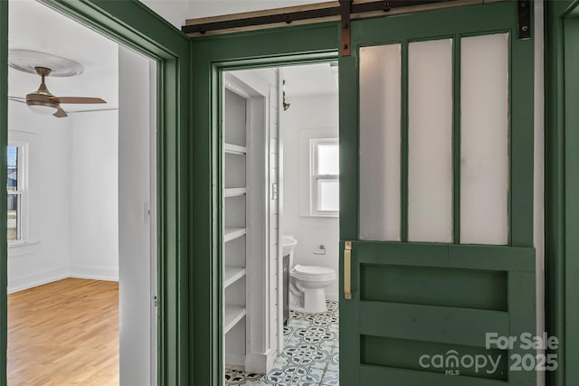 bathroom with ceiling fan