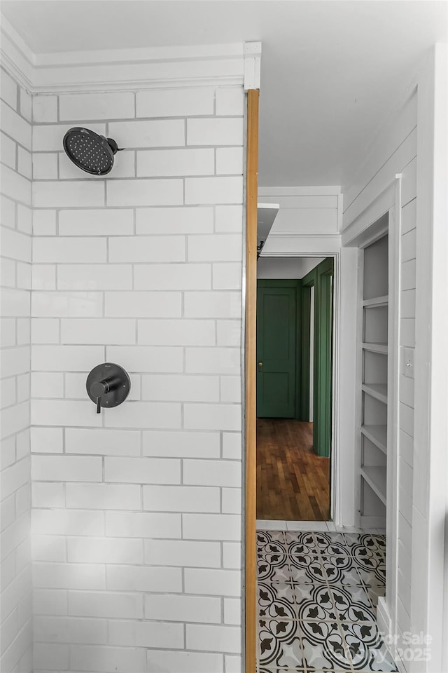 bathroom featuring tile patterned floors and walk in shower