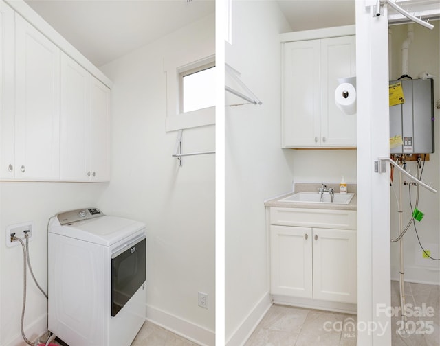 washroom featuring light tile patterned flooring, washer / clothes dryer, sink, cabinets, and tankless water heater