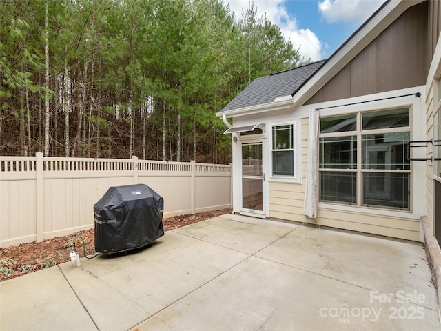 view of patio with a grill