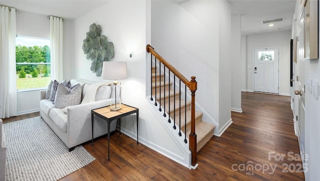 interior space with dark hardwood / wood-style flooring