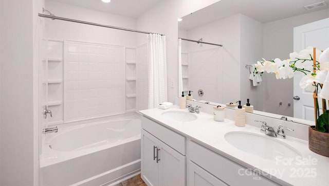 bathroom with shower / tub combo with curtain and vanity