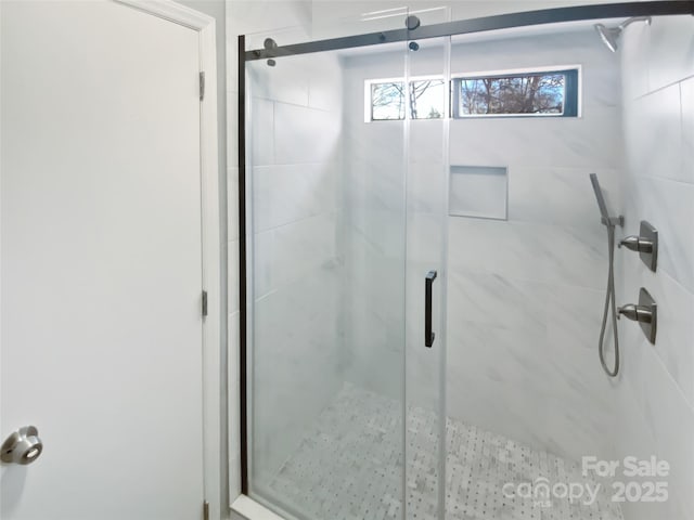 bathroom with an enclosed shower