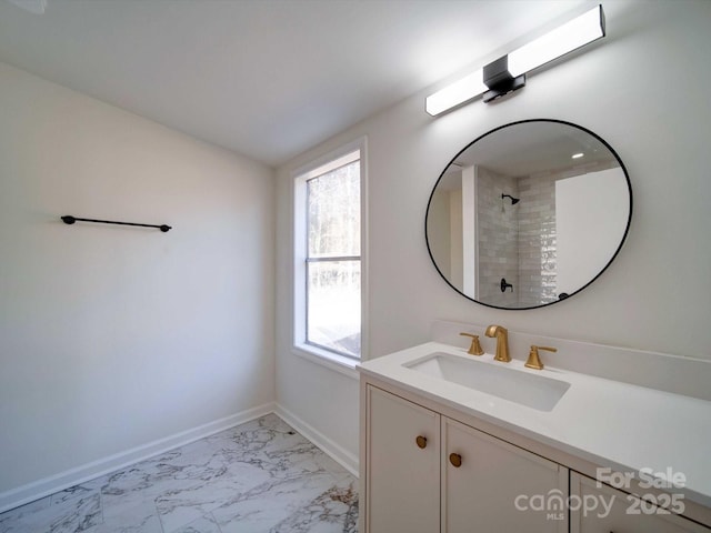 bathroom with vanity and walk in shower