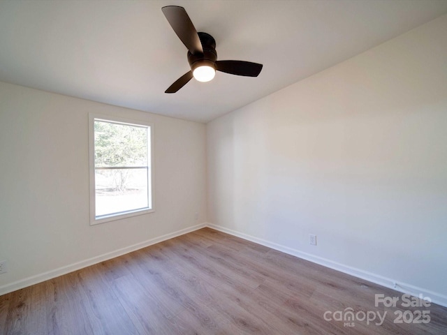 unfurnished room featuring light hardwood / wood-style flooring