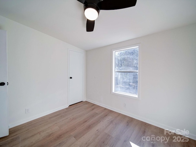 unfurnished room with light hardwood / wood-style floors and ceiling fan