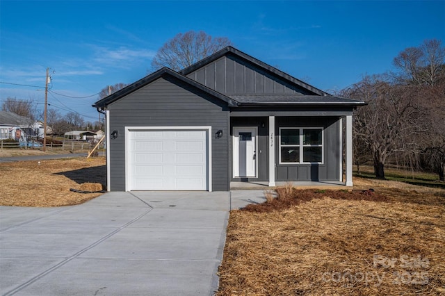 ranch-style house with a garage and a porch