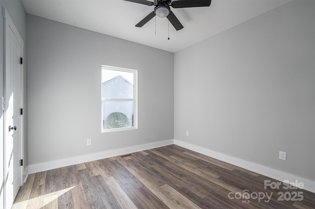 empty room with wood-type flooring and ceiling fan