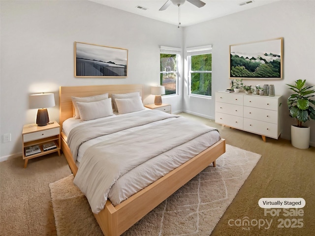 carpeted bedroom featuring ceiling fan