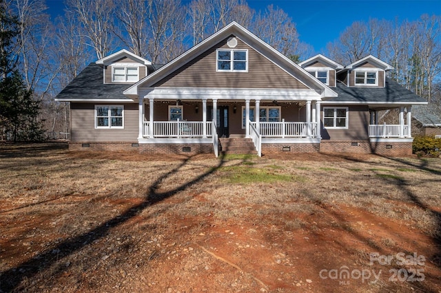 view of front of property with a front yard and covered porch