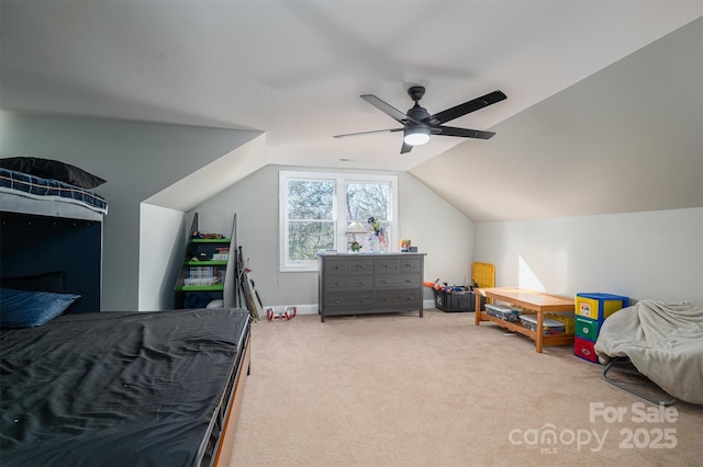 carpeted bedroom featuring vaulted ceiling and ceiling fan