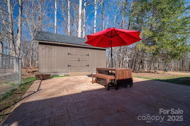 view of patio featuring a storage unit