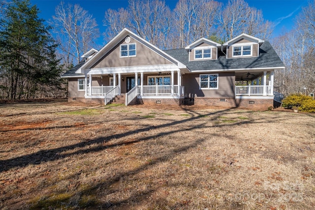 craftsman-style house with a front yard and covered porch