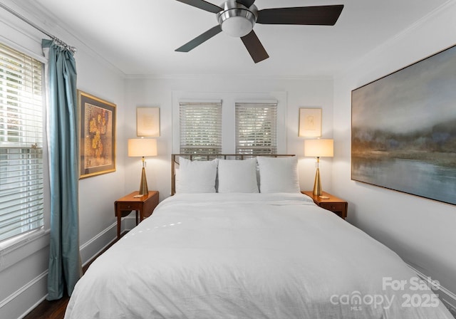 bedroom with a ceiling fan, baseboards, and crown molding