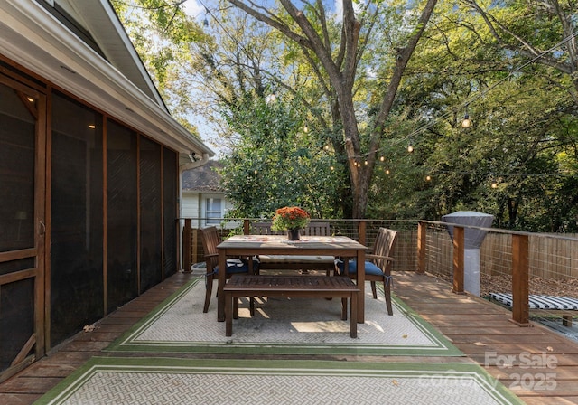 deck featuring outdoor dining space