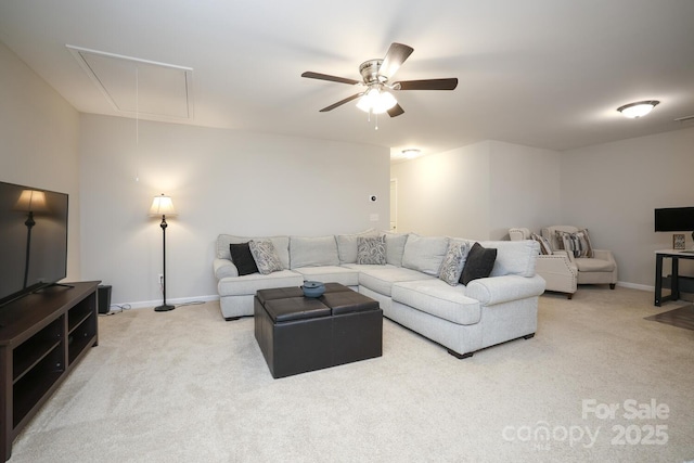 living room with ceiling fan and light colored carpet