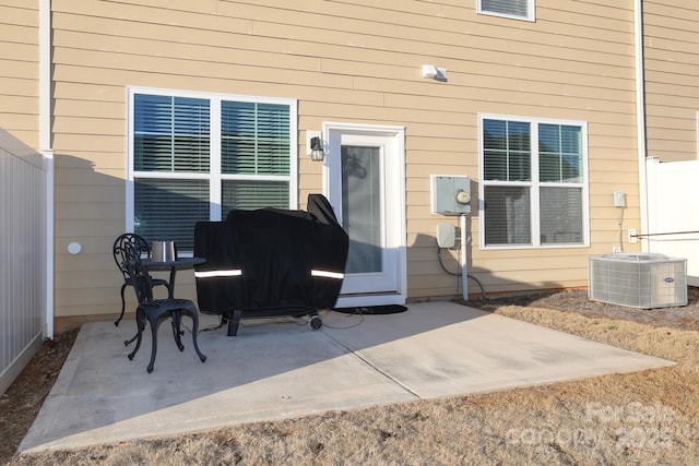 exterior space with a patio and central air condition unit