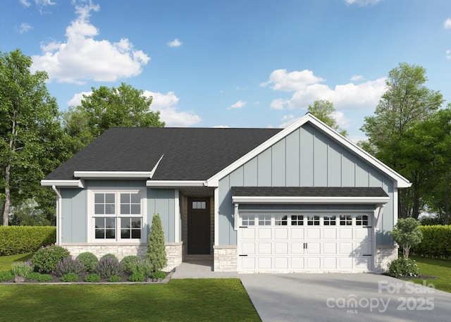 view of front facade with a garage and a front yard