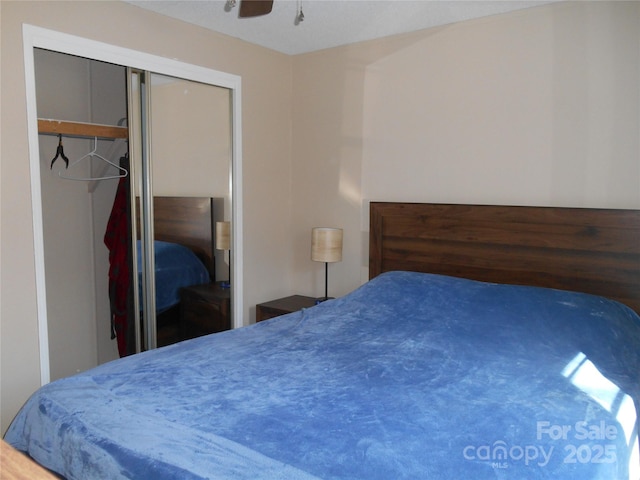 bedroom featuring a closet and ceiling fan