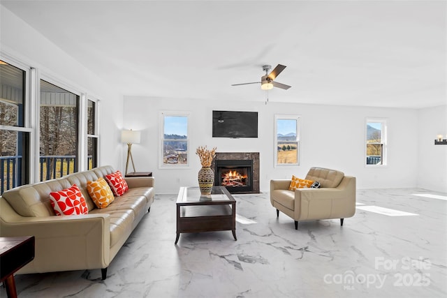 living room featuring ceiling fan