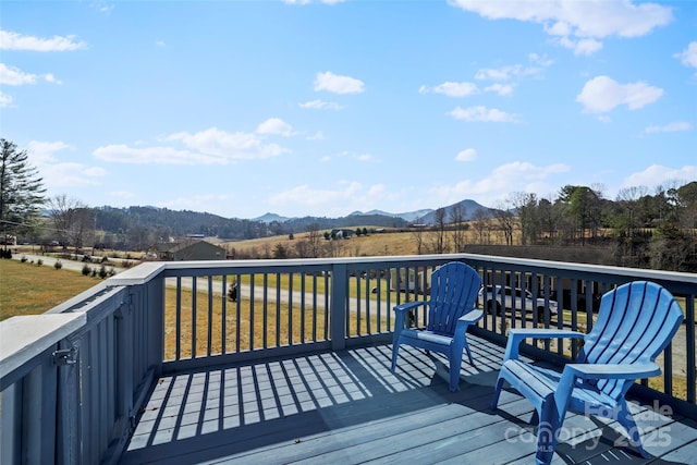 wooden terrace with a mountain view