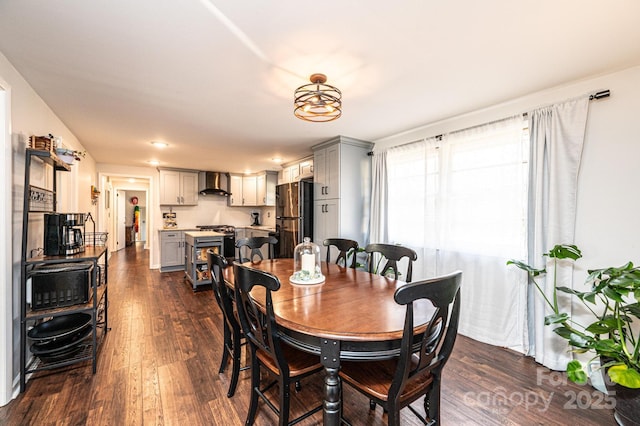 dining area with dark wood-style floors