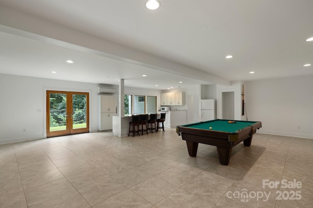 playroom featuring a wall mounted air conditioner, bar area, pool table, and french doors