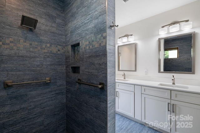 bathroom with vanity and wood-type flooring