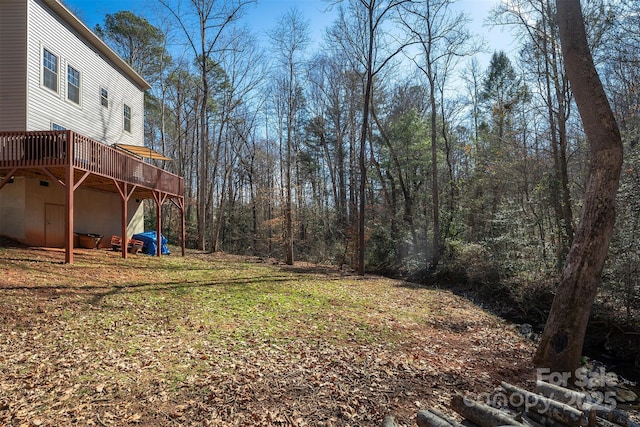 view of yard featuring a deck