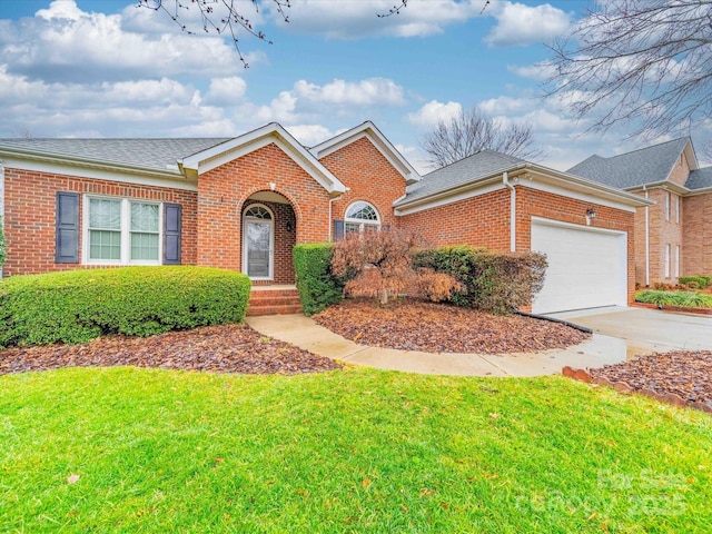 ranch-style house with a garage and a front lawn