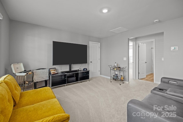 living room featuring light colored carpet