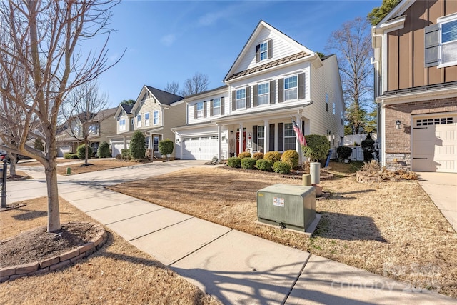 front of property with a porch and a garage