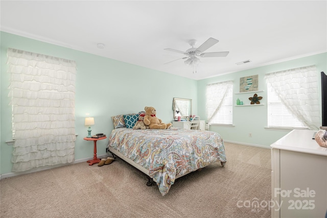 carpeted bedroom with ceiling fan