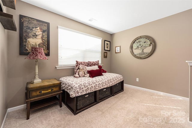 bedroom with light carpet