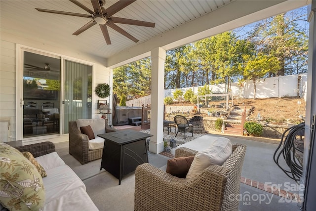 view of patio featuring ceiling fan and an outdoor hangout area