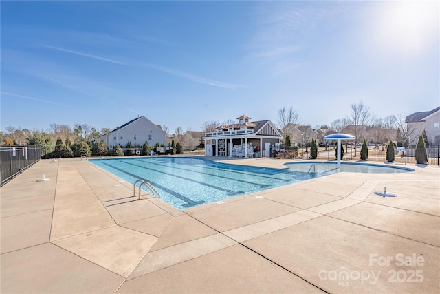 view of pool featuring a patio area