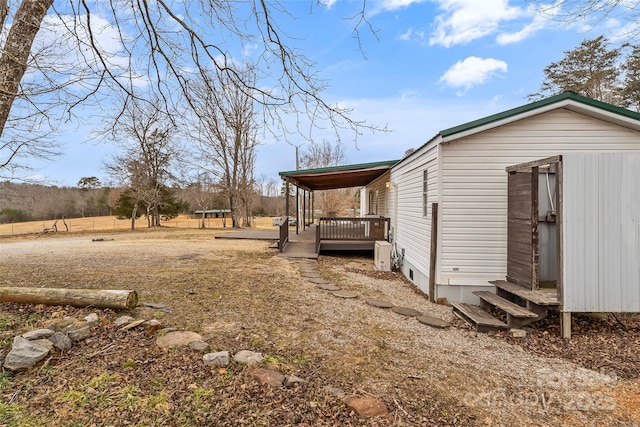 view of yard featuring a deck