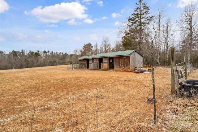 view of outdoor structure featuring a rural view