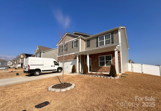 view of front of house with a garage and covered porch