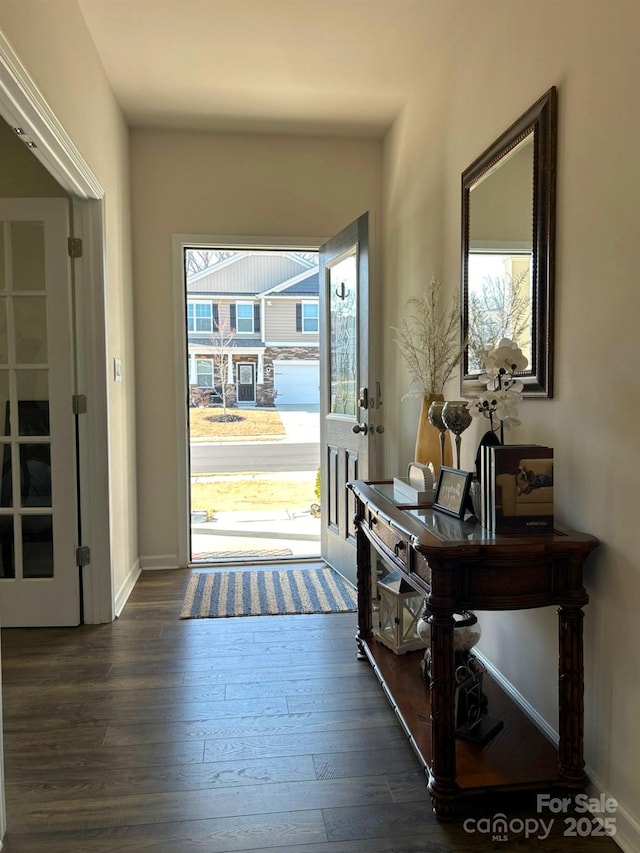 foyer featuring dark hardwood / wood-style floors