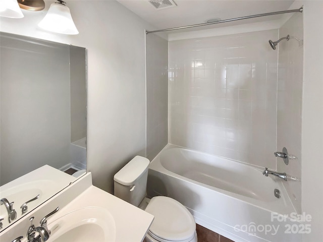 full bathroom with shower / bathing tub combination, vanity, and toilet