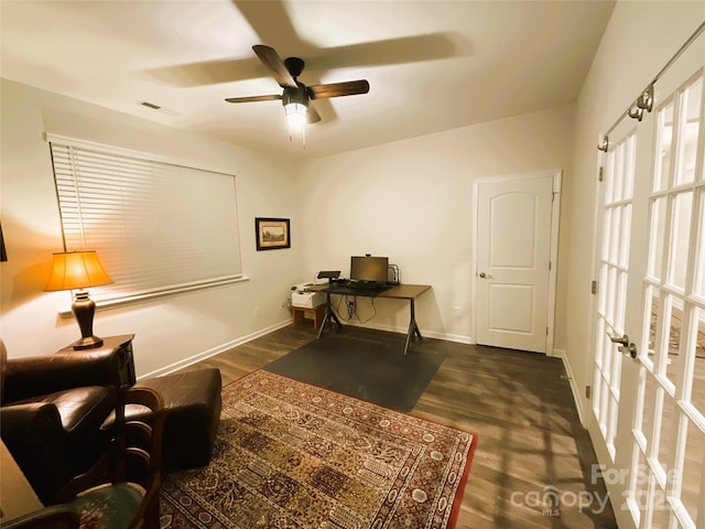 office area featuring dark hardwood / wood-style floors and ceiling fan