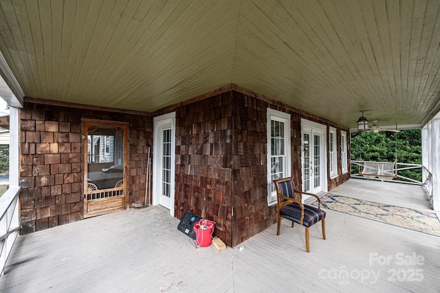 view of patio featuring a porch