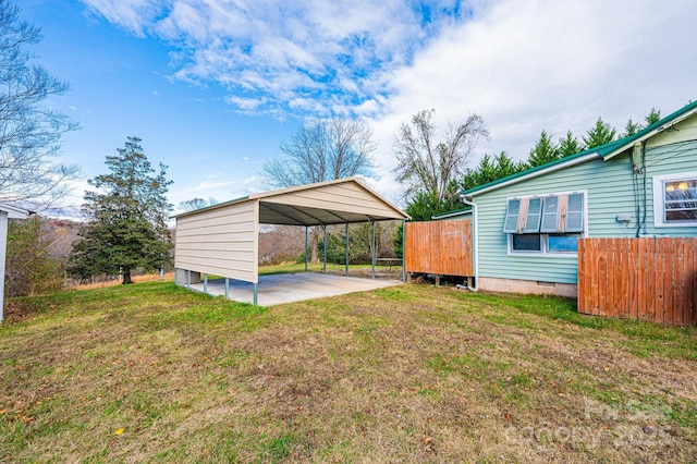 view of yard featuring a carport