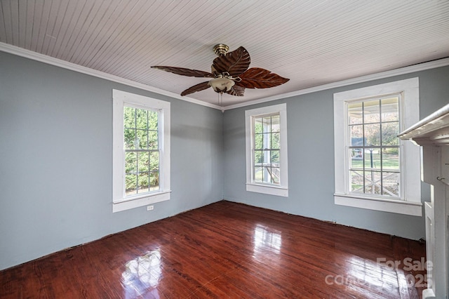 unfurnished room with crown molding, ceiling fan, plenty of natural light, and dark wood-type flooring