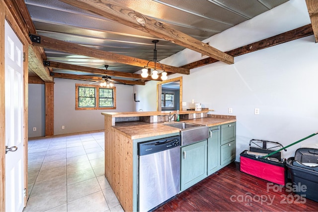 kitchen with wood counters, hanging light fixtures, dishwasher, beamed ceiling, and ceiling fan