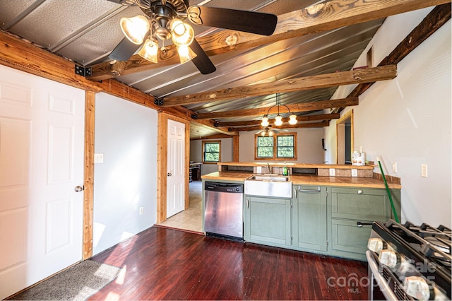 kitchen featuring hardwood / wood-style flooring, stainless steel appliances, sink, and vaulted ceiling with beams