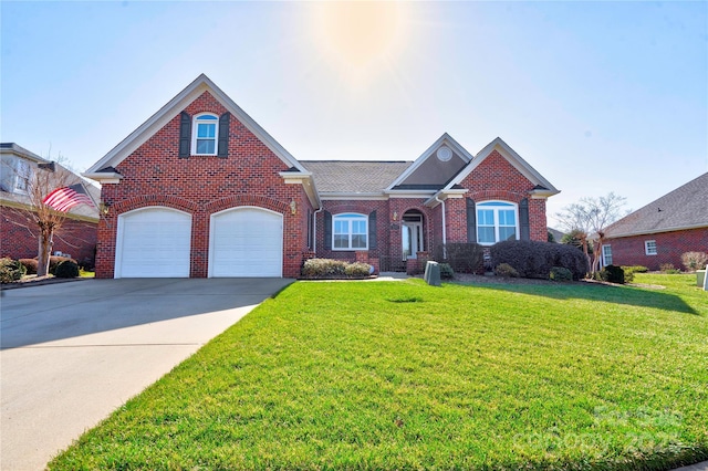 view of front of home with a garage and a front yard