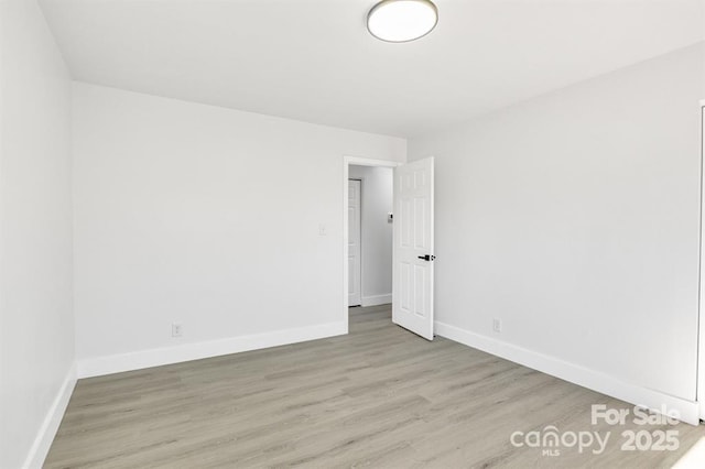 empty room featuring light hardwood / wood-style floors