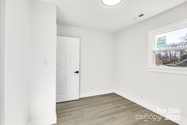 empty room featuring light wood-type flooring